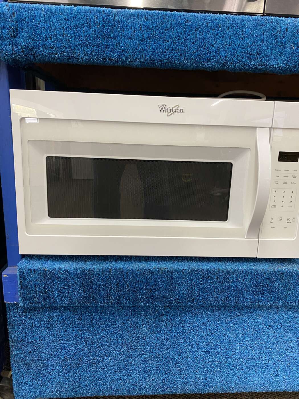Reconditioned WHIRLPOOL 1.7 Cu. Ft. 1000 Watt 300 CFM OTR Microwave – White