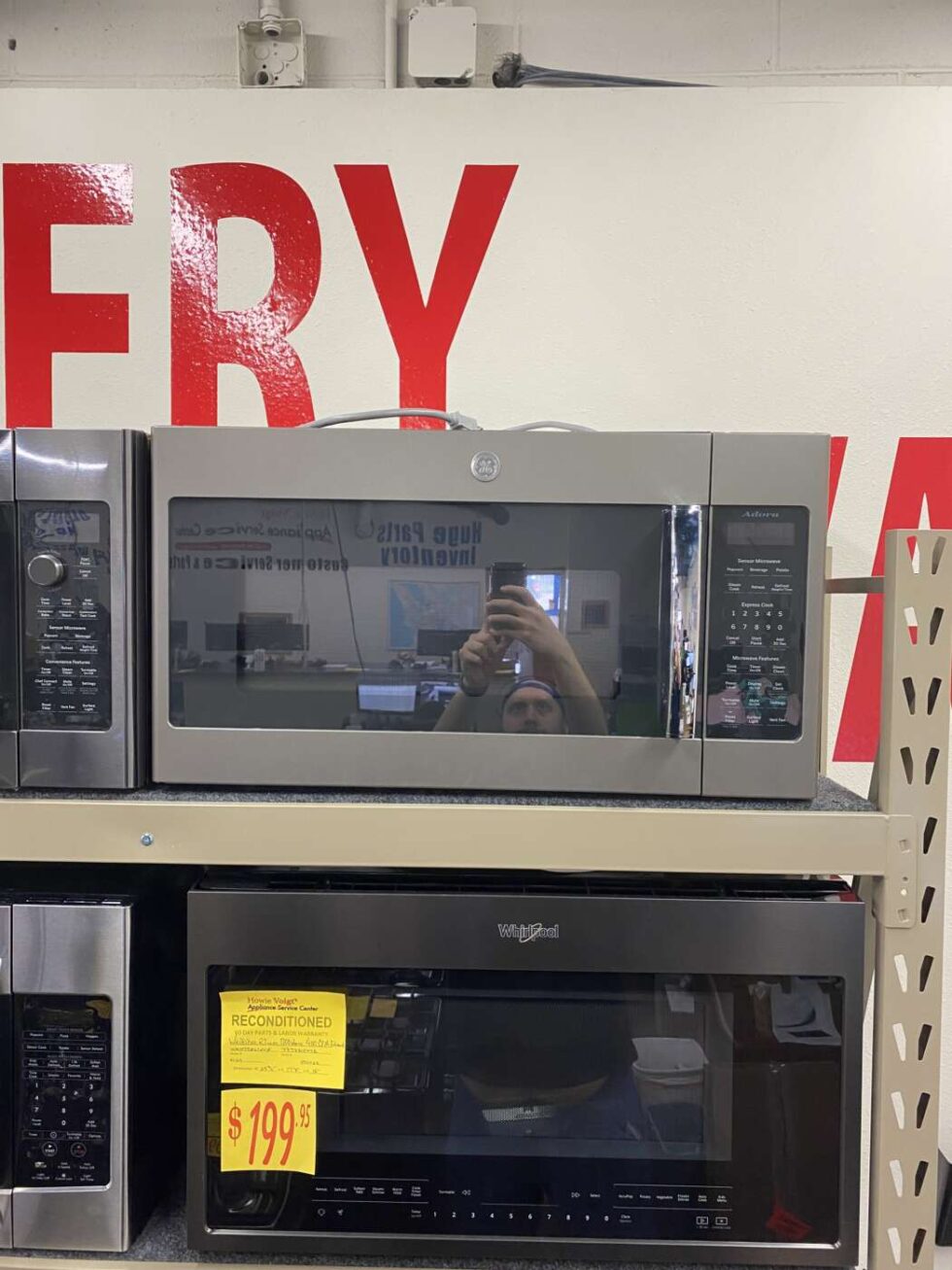 Reconditioned Over the range Microwave Howie Voigt