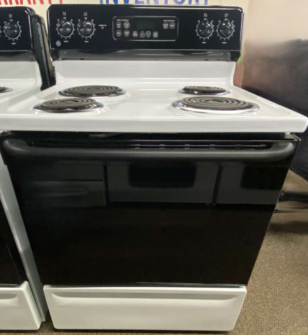 Reconditioned GE Coil-Top Electric Range (White & Black)