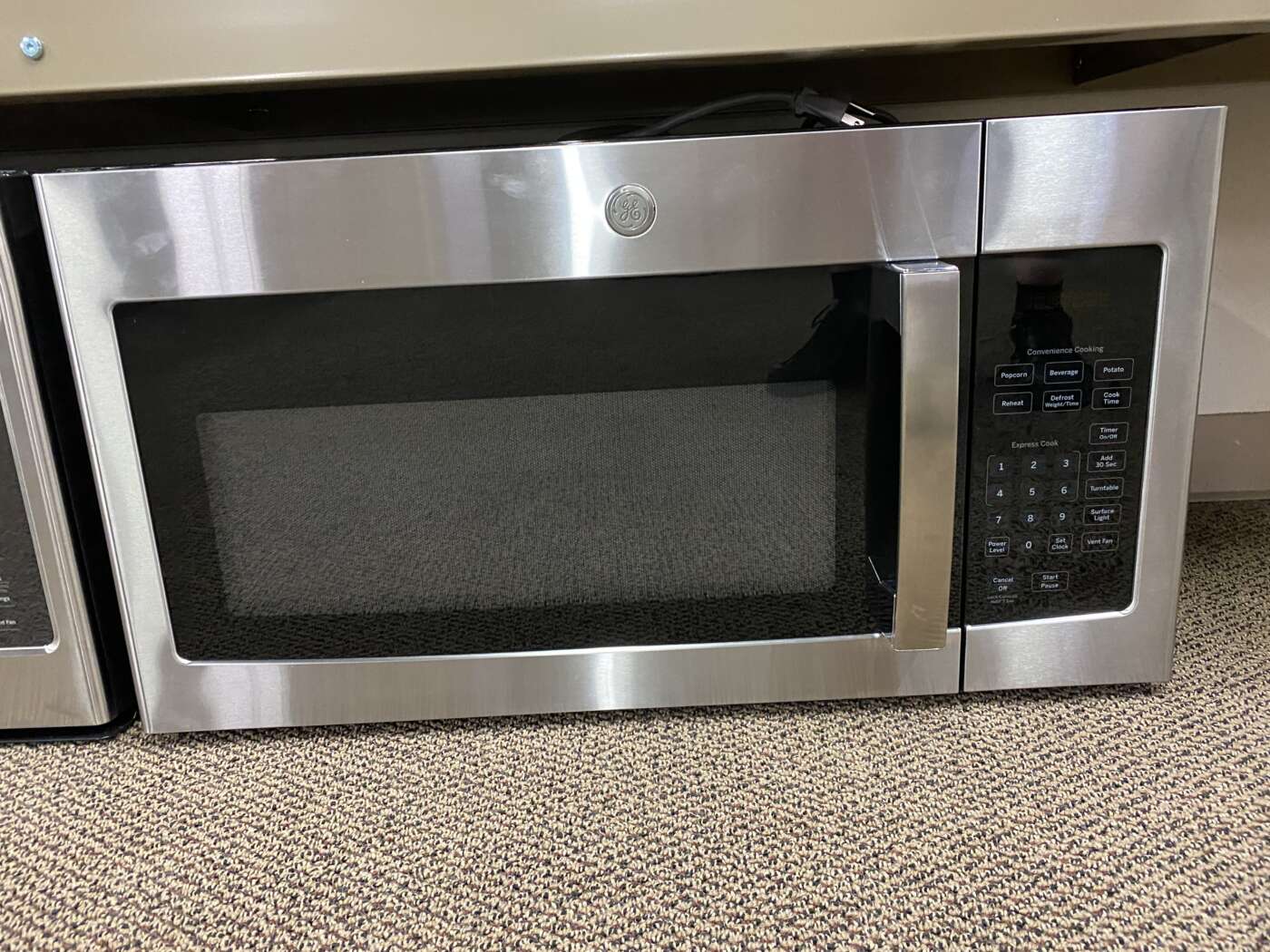 Reconditioned GE 1.6 cu. ft. Over the Range Microwave (Stainless Steel)