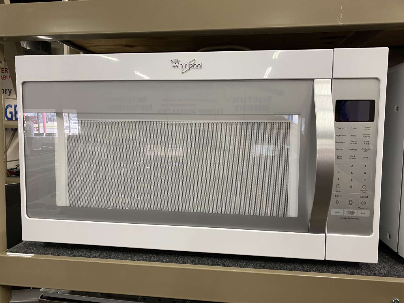 Reconditioned Whirlpool 2.1 cu. ft. Over the Range Microwave (White)