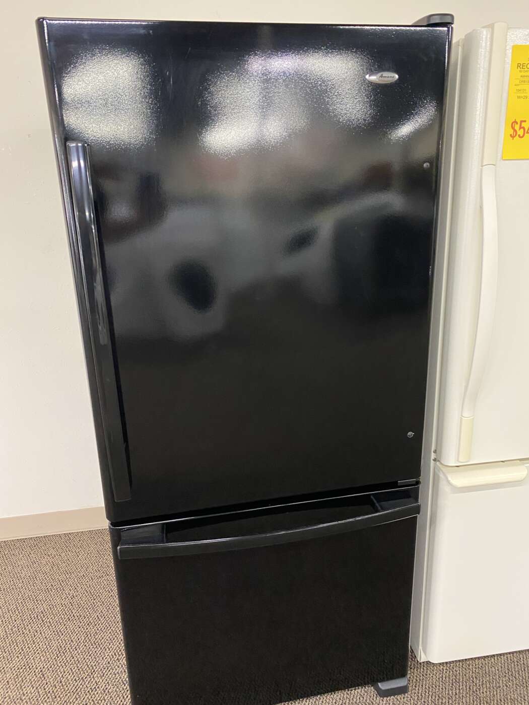 Reconditioned Amana 18 cu. ft. Bottom Freezer Refrigerator (Black)