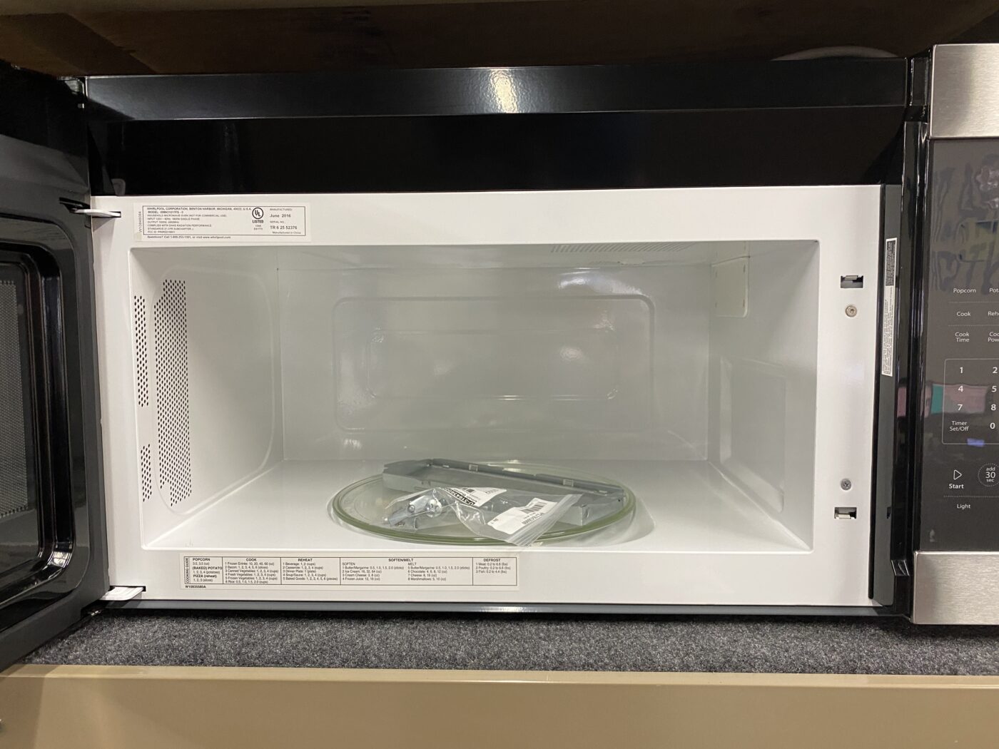 Reconditioned Whirlpool 1.7 cu. ft. Over the Range Microwave (Stainless Steel)