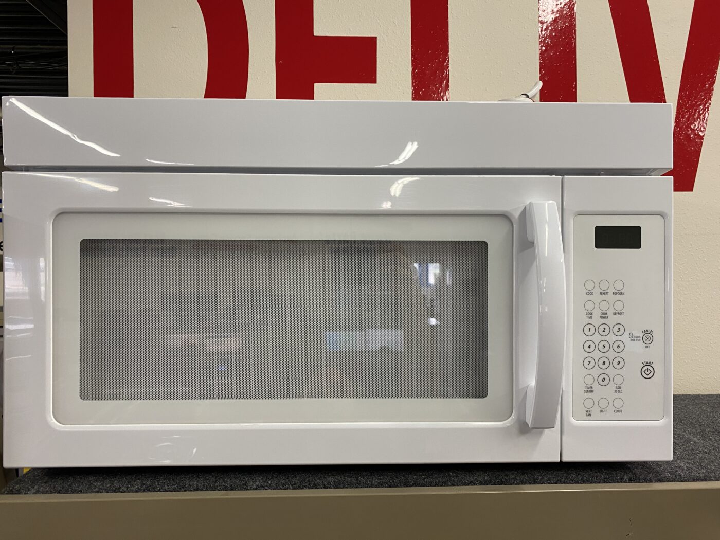 Reconditioned Whirlpool 1.6 cu. ft. Over the Range Microwave (White)