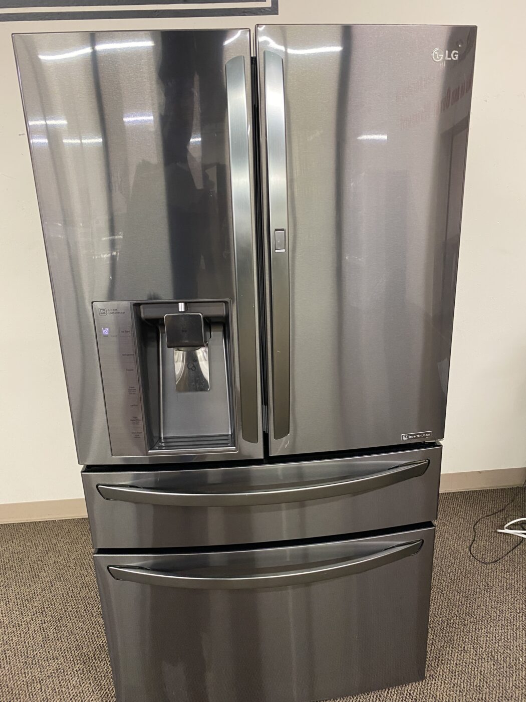 Reconditioned LG 30 cu. ft. French Door Refrigerator with Ice and Water Dispenser (Black Stainless Steel)
