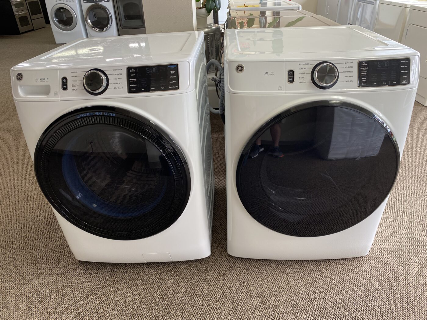 Reconditioned GE 4.5 cu. ft. Front Load Washer & 7.8 cu. ft. Electric Dryer (White)