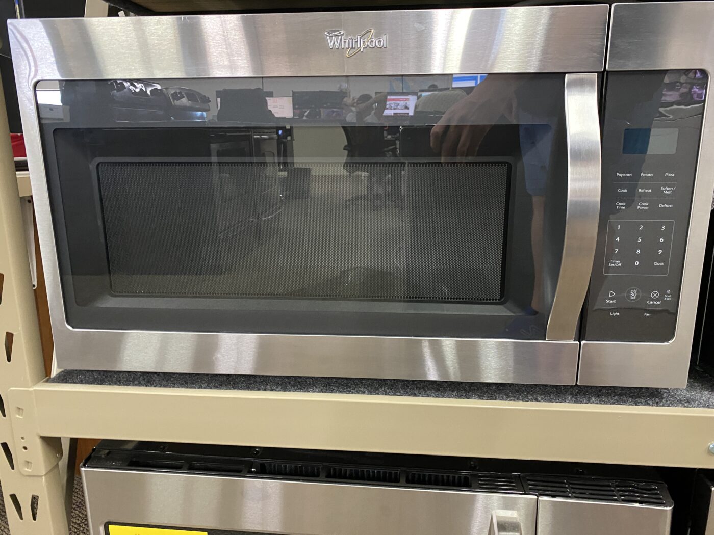 Reconditioned Whirlpool 1.7 cu. ft. Over the Range Microwave (Stainless Steel)