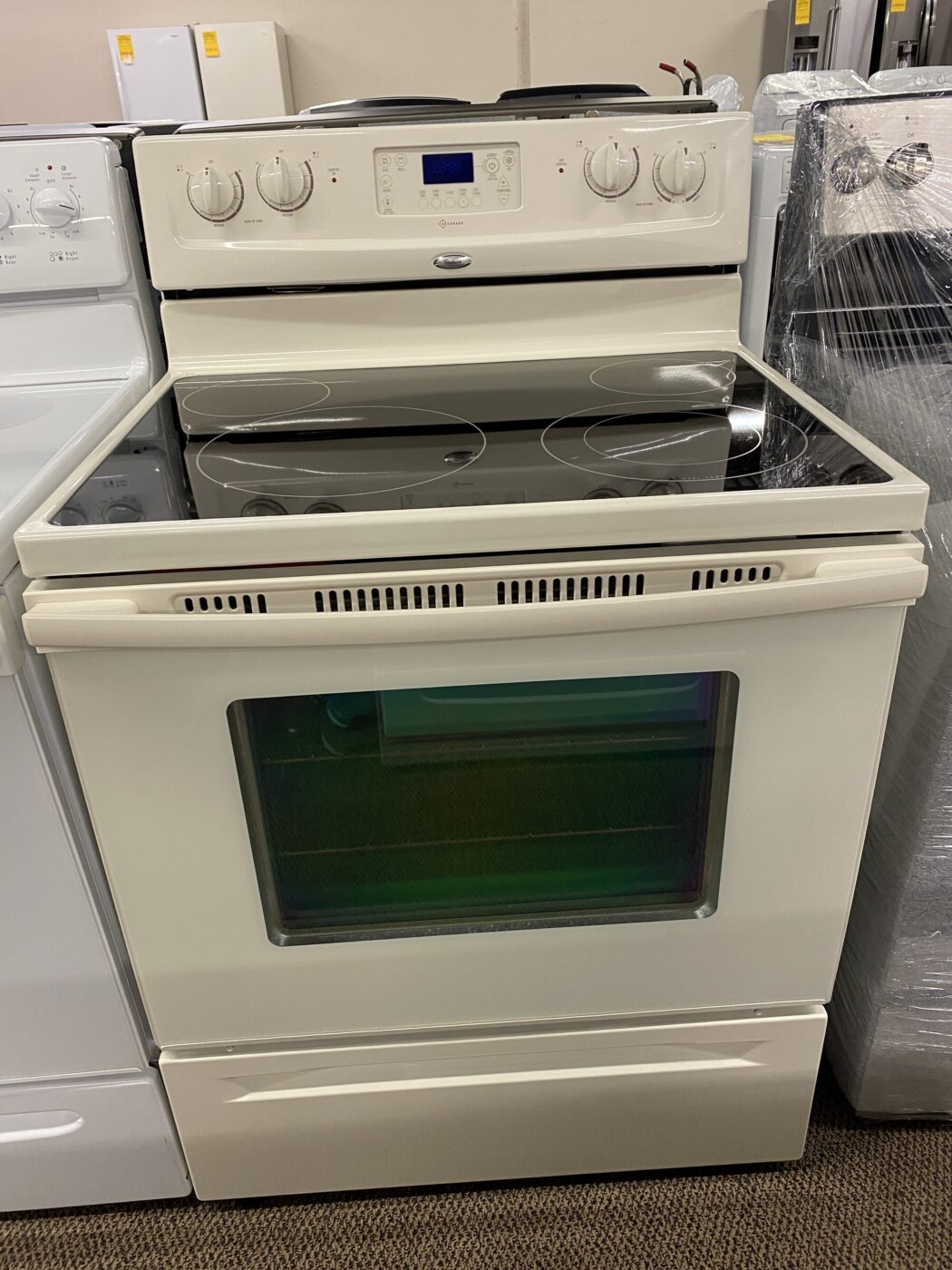 Reconditioned Whirlpool Smooth Top Electric Range (Bisque)