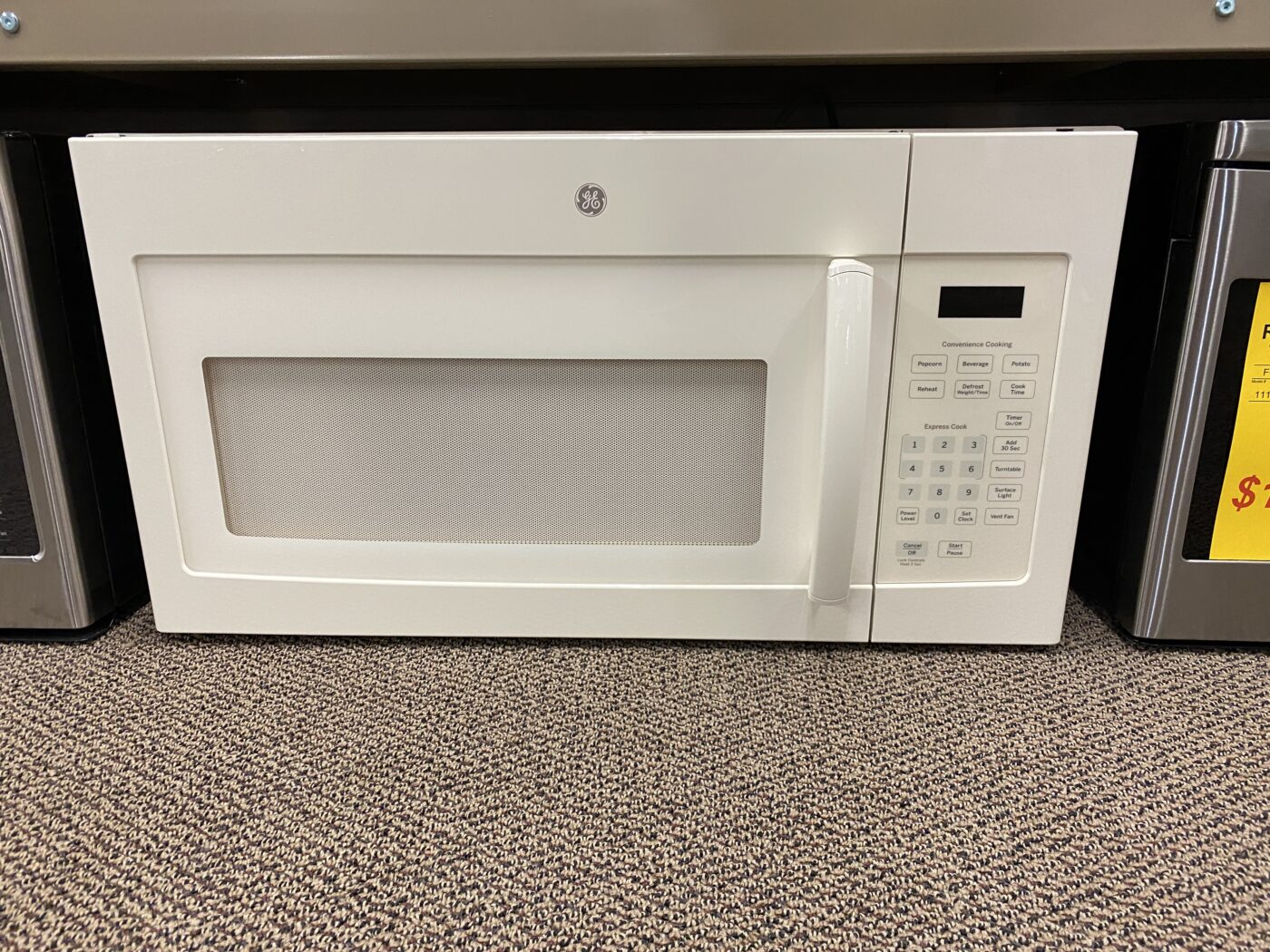 Reconditioned GE 1.6 cu. ft. Over the Range Microwave (Bisque)