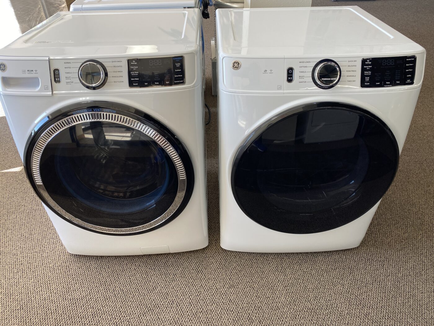 Reconditioned GE 4.8 cu. ft. Front Load Washer & 7.8 cu. ft. Electric Dryer (White)