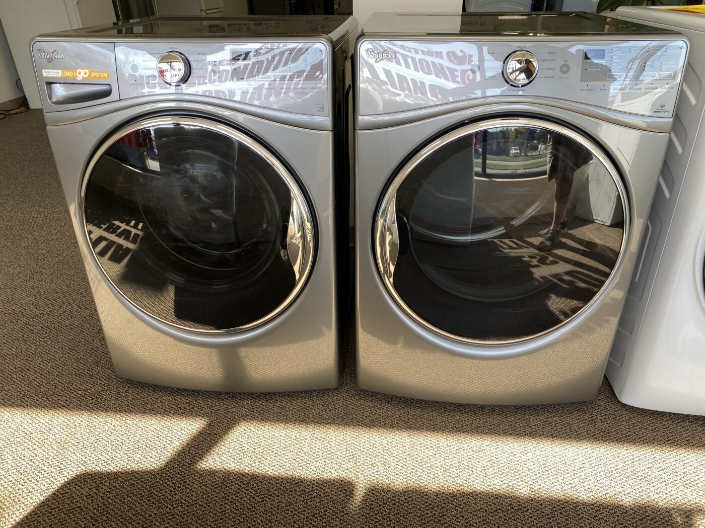 Reconditioned Whirlpool 4.5 cu. ft. Front Load Washer & 7.4 cu. ft. Electric Dryer (Chrome Shadow)