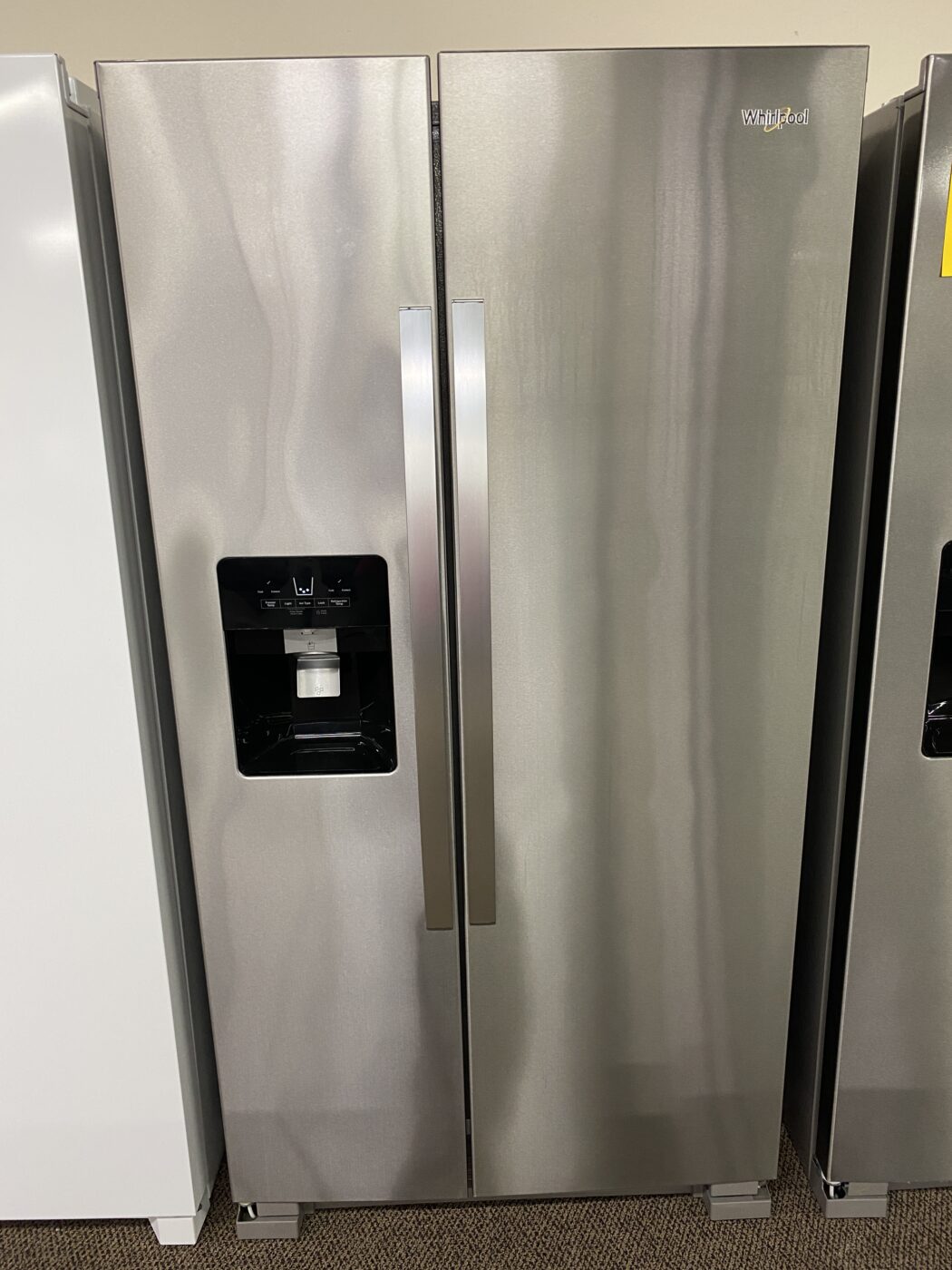 Reconditioned Whirlpool 25 cu. ft. Side by Side Refrigerator with Water & Ice Dispenser (Stainless Steel)