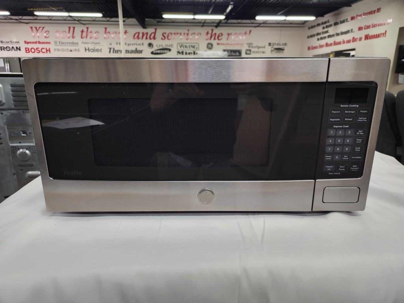 Reconditioned GE 1.1 cu. ft. Countertop Microwave (Stainless Steel)