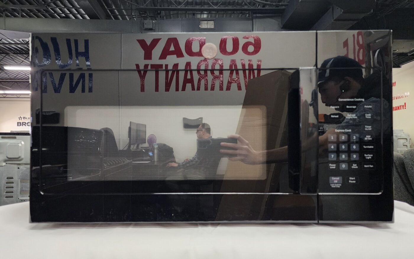 Reconditioned GE 1.6 cu. ft. Over the Range Microwave (Black)