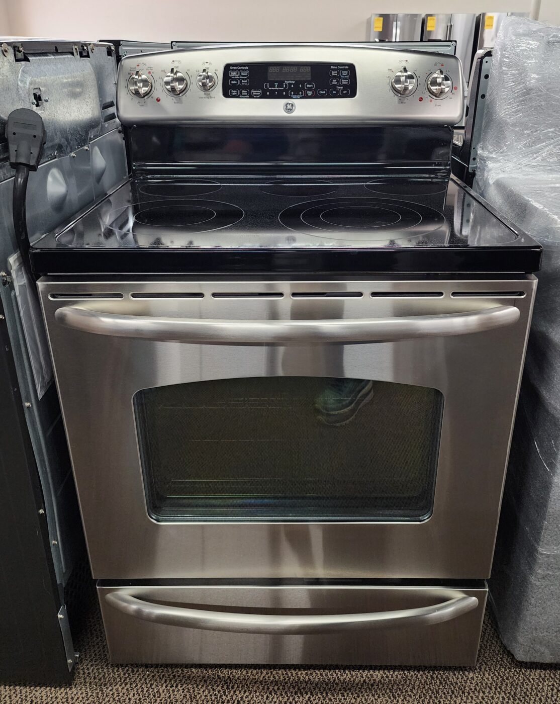 Reconditioned GE Smooth Top Electric Range (Stainless Steel)