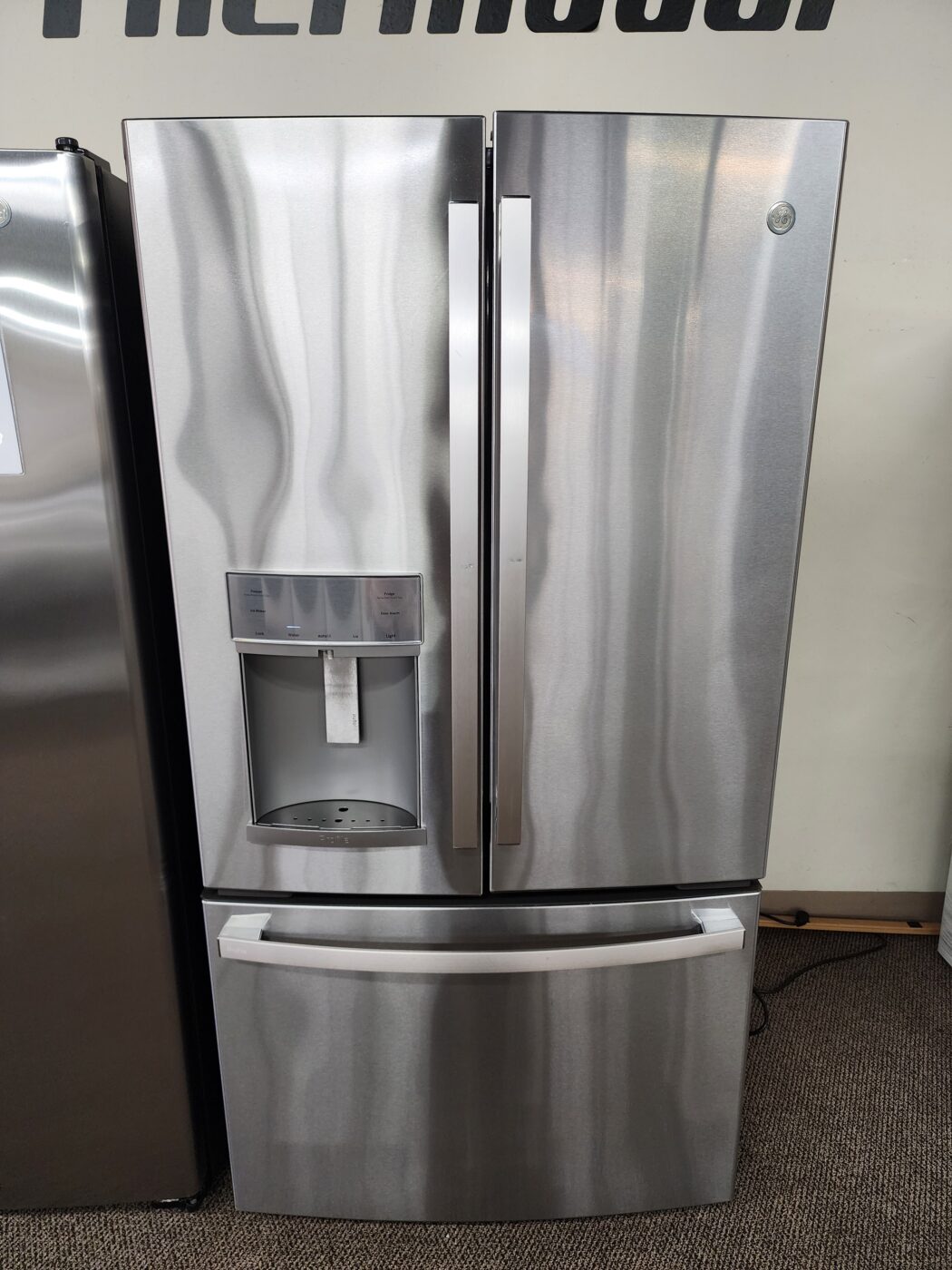 Reconditioned GE 27.7 cu. ft. French Door Refrigerator with Ice & Water Dispenser (Stainless Steel)