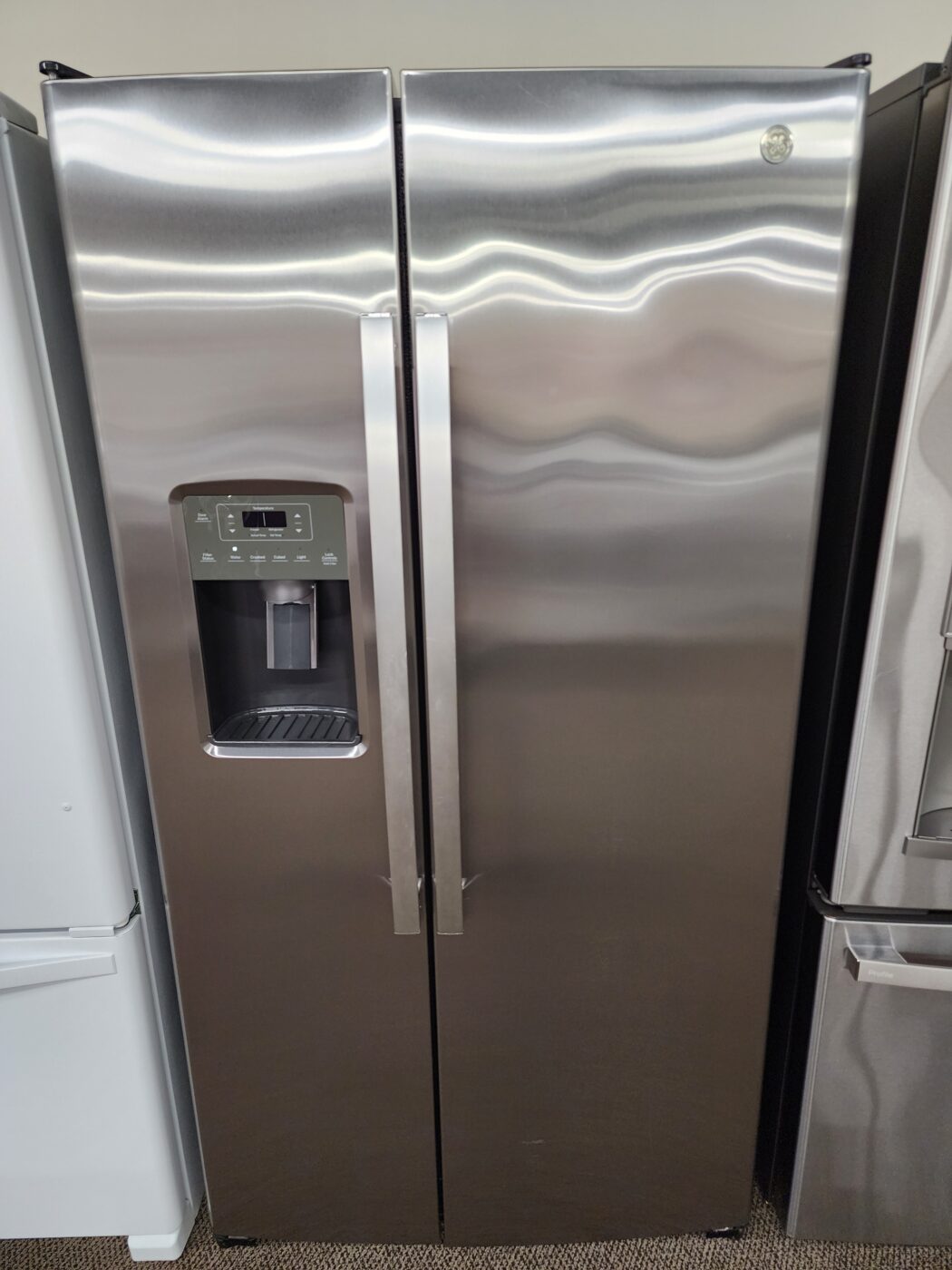 Reconditioned GE cu. ft. Side-by-Side Refrigerator with Ice and Water Dispenser (Stainless Steel)